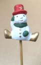 Schneemann mit grünem Schal und rotem Zylinder mit Stern